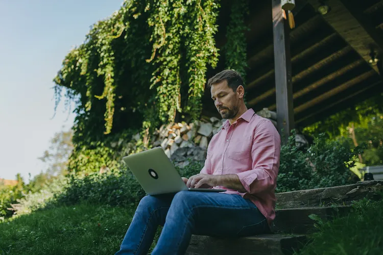 business man working on laptop finding a franchise match