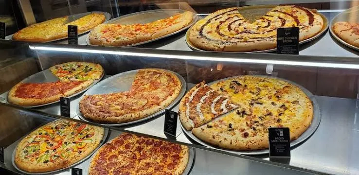 Freshslice Pizza display with pizzas available by the slice